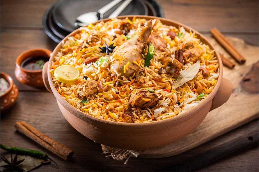 Chicken Pilao cooked with tender chicken pieces, spices, and herbs